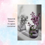 photo of seasonal flowers in a glass vase